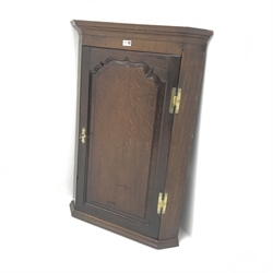  19th century oak corner cupboard, projecting cornice, single door enclosing two shaped shelves, W68cm, H97cm, D43cm  