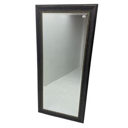 Bevelled wall mirror in bronze finish frame 
