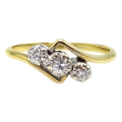  Gold three stone diamond cross over ring, stamped 18ct plat  