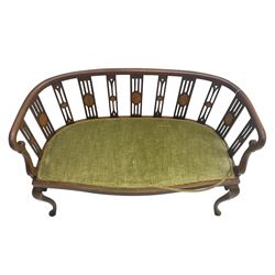 Edwardian inlaid mahogany salon settee or bench, the pierced and inlaid splat back over serpentine front, seat upholstered in laurel green velvet, raised on cabriole supports with satinwood stringing