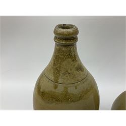  19th century salt glazed stoneware gin bottle impressed John Shaw, Red Lion Vaults, Whitefriargate, Hull of bulbous oval form H27cm and another with impressed label for J. Christie Mytongate Hull (2)  