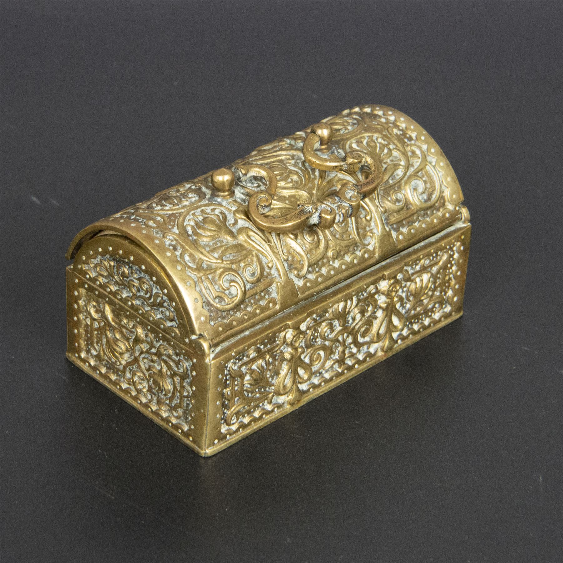 Gilt bronze mounted black glass seal, contained within a brass casket, with velvet interior and inner label reading 'C. F. Schmedding Augsburg', together with a porcelain handled seal decorated with floral sprays on a pink ground