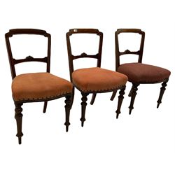 Set six Victorian walnut dining chairs, incised crest rail over floral carved bar back, upholstered seat pads, raised on turned supports W49cm
