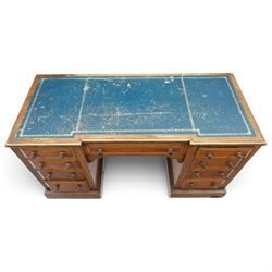 Victorian mahogany inverse breakfront twin pedestal desk, inset leather top over central drawer, flanked by pedestals with four graduating drawers, raised on a plinth base