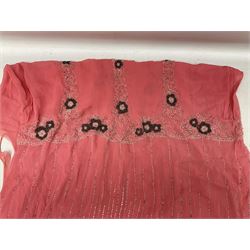 Art Deco pink flapper type beaded dress, with floral motifs and tasselled clear and black beadwork throughout