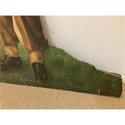 Military Outfitters hand painted life size wooden cut out figure of a WW1 soldier standing at ease holding a gun by his side, marked Stening Signs; hardboard on planked frame H199cm