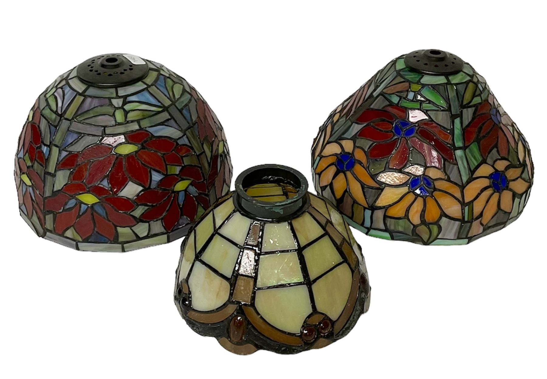 Three Tiffany style lamp shades, each with multicoloured floral decoration, largest D20.5cm