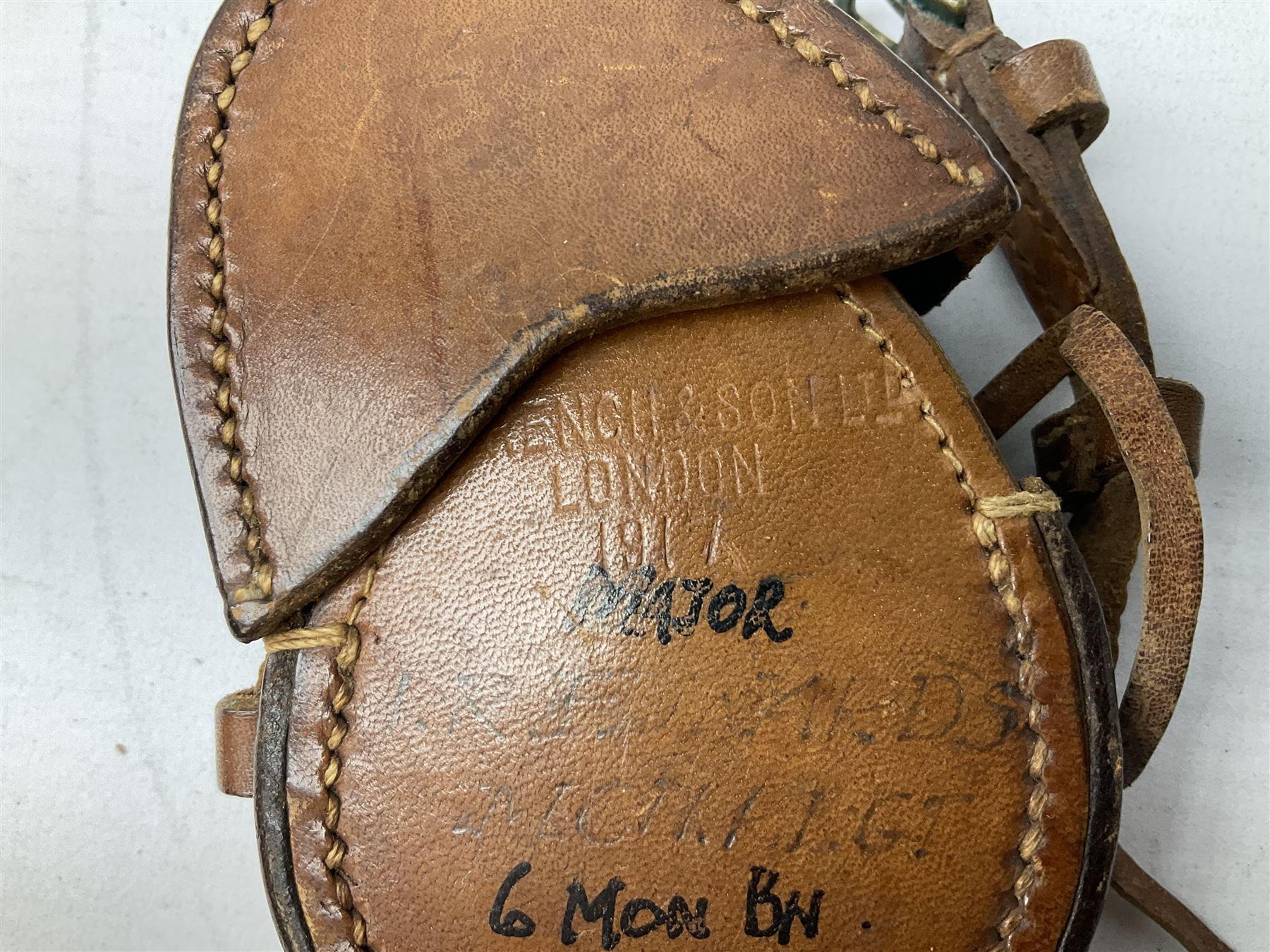Two WW1 verniers pattern marching compasses, one dated 1917 in leather case impressed French & Son with manuscript details Major I.R. Edwards Mon. Regt., the other inscribed J.H. Steward 1903 in leather case with manuscript details G.L. Stirling Barnsley; four WW1 linen backed folding maps of Palestine and Telfit; another WW2 map of Swansea and Aberdare; and quantity of military and other postcards