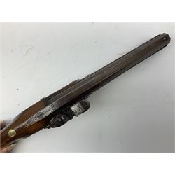 Early 19th century flintlock 16-bore overcoat/duelling pistol by William Bond Lombard Street London, the 23cm octagonal brown stub twist damascus barrel with small foresight, two barrel pins and ram rod under, inscribed Lombard Street London to the top and W. Bond to the action, full walnut stock with lightly engraved steel furniture, pineapple finial and escutcheon, half cock facility L39cm; loose mounted on later mahogany display stand with trade label
