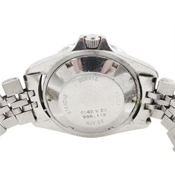 Tag Heuer gentleman's stainless steel automatic wristwatch, Ref. 669.206F, black dial with luminous hour markers, on original stainless steel bracelet,, with fold-over clasp and one other Tag Heuer Night Diver gentleman's stainless steel quartz wristwatch, cream luminous dial, on original stainless steel bracelet, both boxed