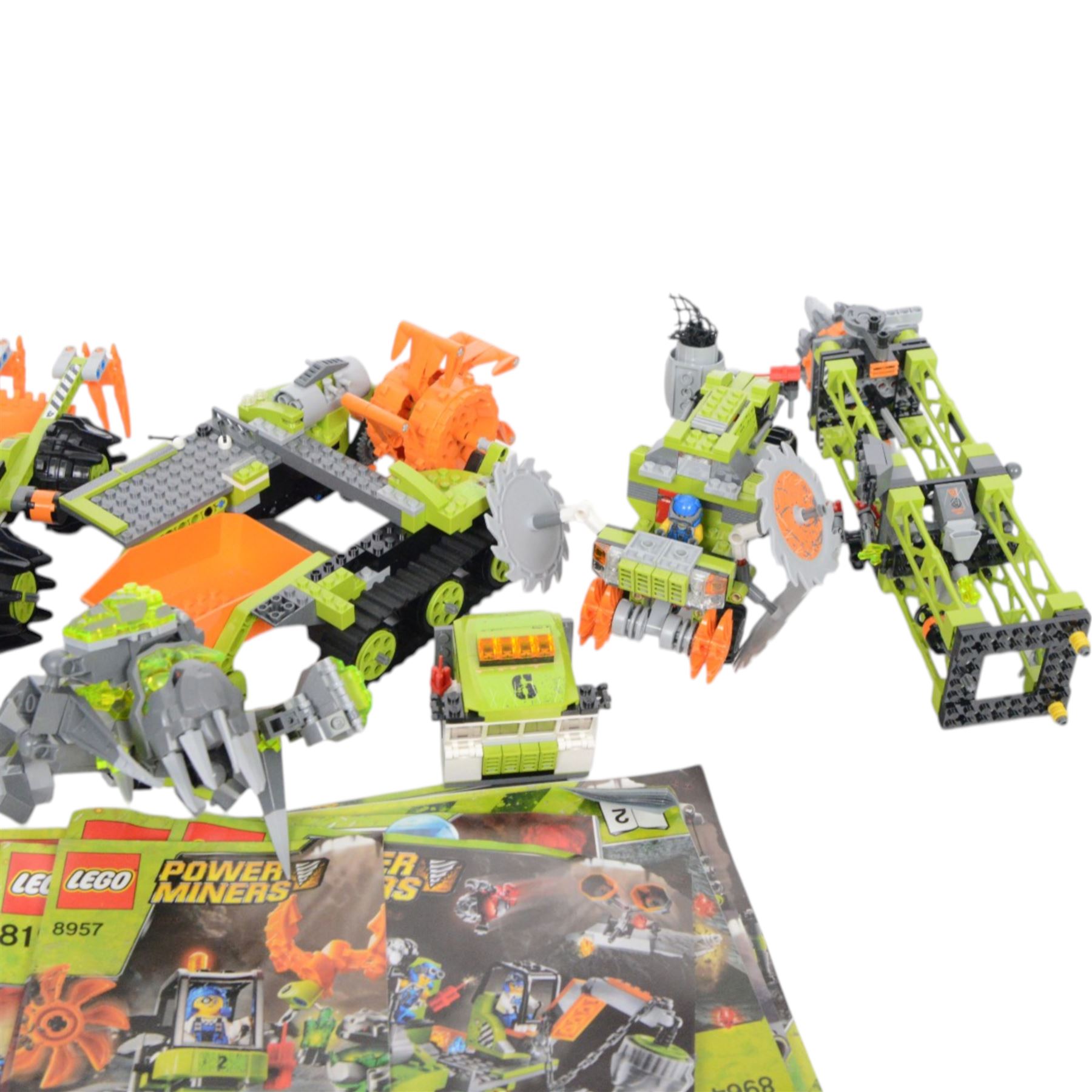 Lego Power Miners sets, including 8957, 8964, 8958, 8190, 8189, 8961 and 8963, all partially built with instructions