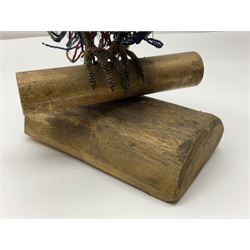 Victorian bead and wire model of a parrot, of polychrome beads, with glass eyes, on a wooden base, H24cm