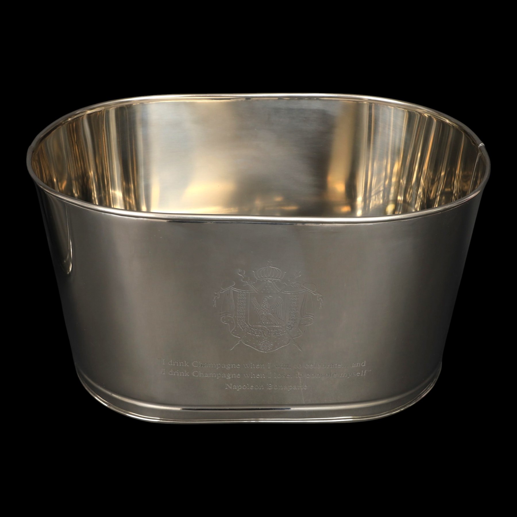 Pair oval champagne coolers, engraved 'I drink champagne when I win to celebrate ... and I drink champagne when I lose to console myself' H25cm, L43cm 