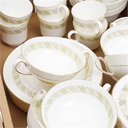 Tuscan Contessa pattern part tea and dinner service, including nine dinner plates, seven twin handled soup bowls, two milk jugs sauce boat and saucer etc in two boxes 