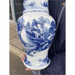 Qing Dynasty Yen Yen blue and white vase in the Kangxi style decorated with a lake landscape surrounded by rocky cliffs, figures in a boat and on the shore H45cm 