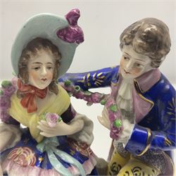18th century Chelsea figure group, modelled as a couple in period costume, the man kneeling and draping a floral garland across the woman, gold anchor mark to the back, H18cm
