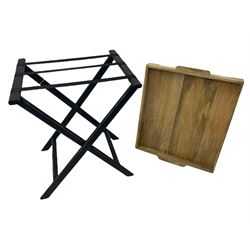 Light wood butlers tray on black painted folding stand 
