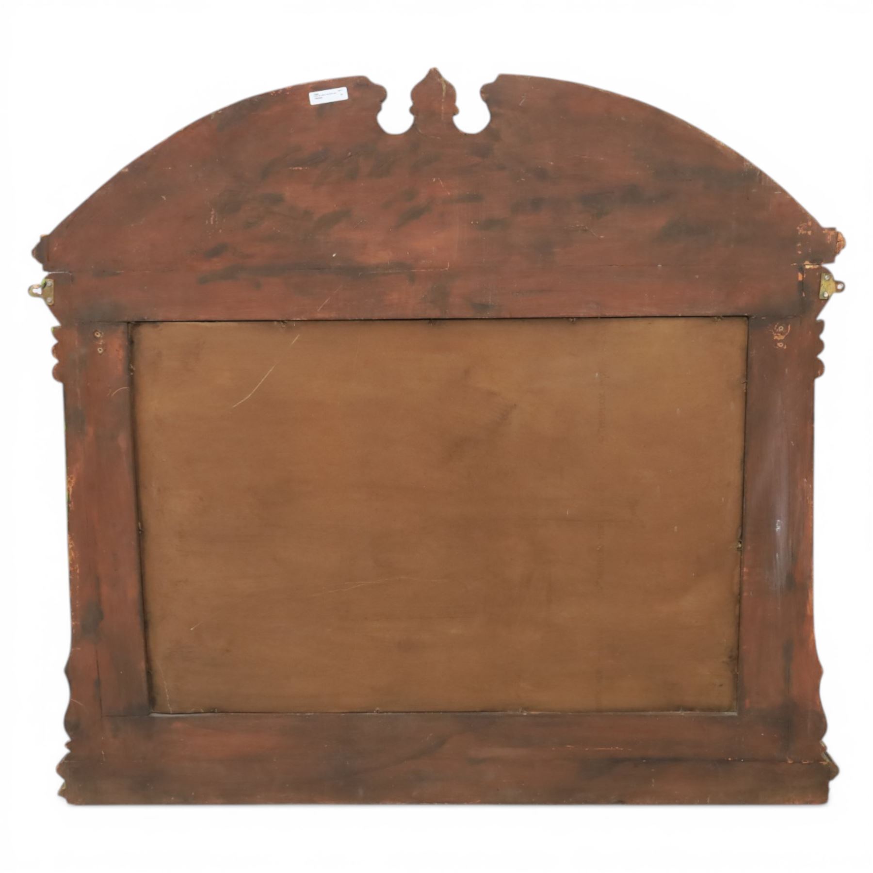 Late 20th century Venetian style polychrome carved wall mirror, arched cresting with central shell motif and scrolling foliate decoration, moulded frame with carved floral borders in relief, enclosing rectangular mirror plate, shaped sides with scroll terminals