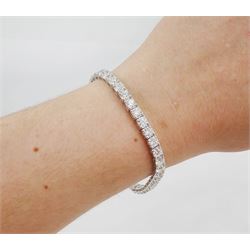 18ct white gold diamond bracelet, forty round brilliant cut diamonds of approx 12.20 carat, stamped, with World Gemological Institute Report