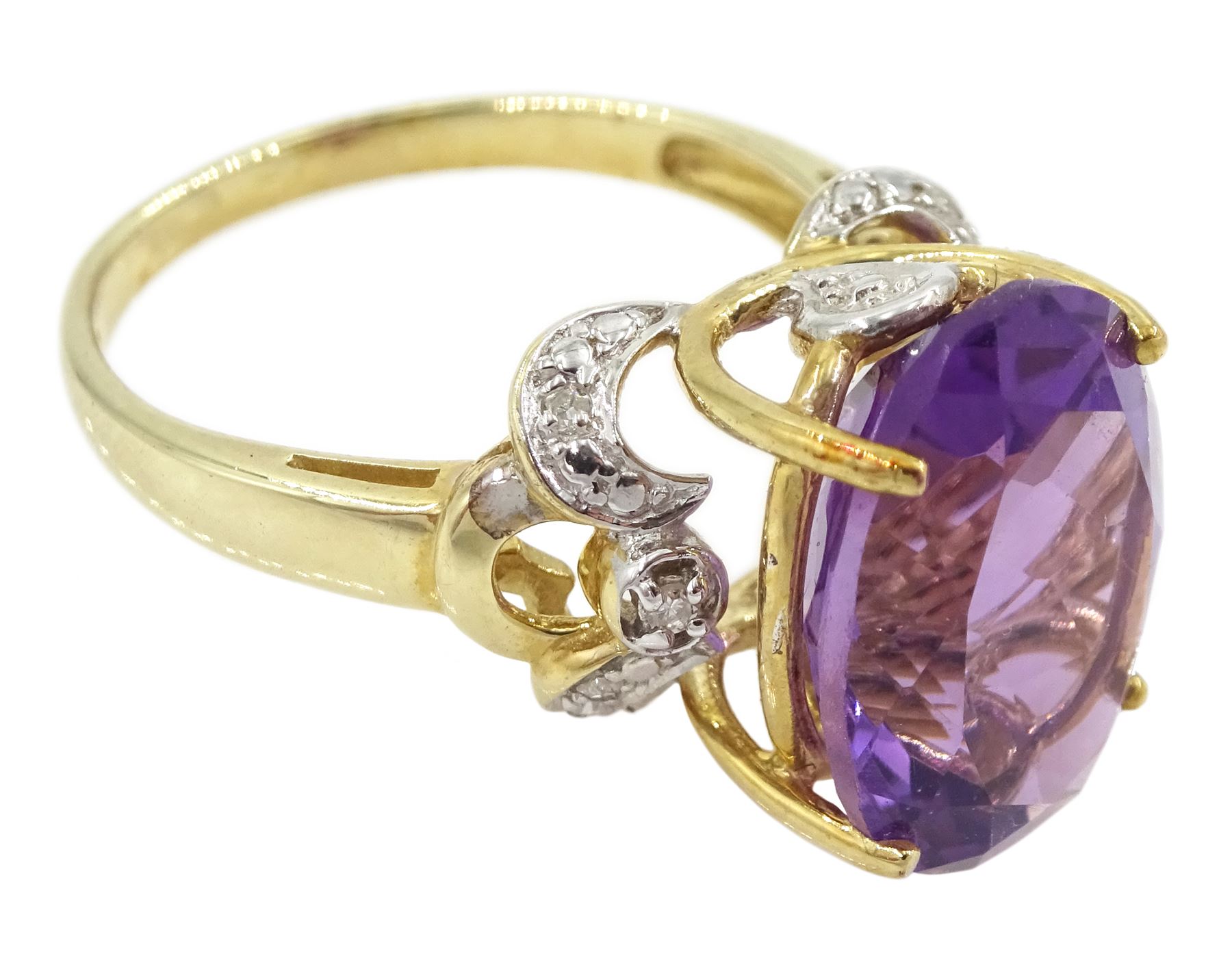 9ct gold single stone oval cut amethyst ring, with openwork diamond set shoulders, hallmarked