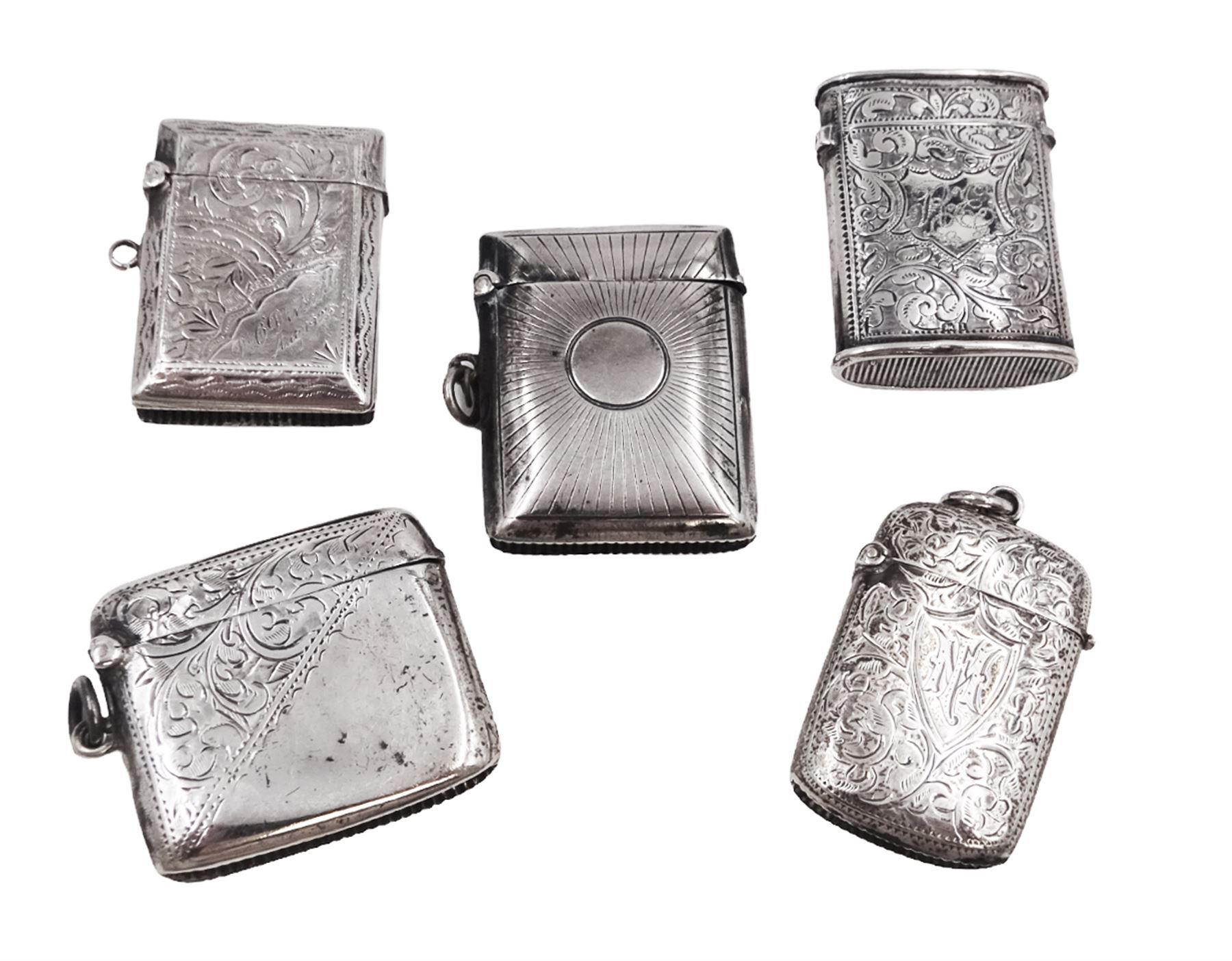 Five Victorian and later silver vesta cases, including Edwardian example with engraved sunburst decoration, hallmarked Abrahall & Bint, Birmingham 1905, and an early 20th century example with engraved foliate decoration and pull-out match compartment, hallmarked Sydney & Co, Birmingham 1910