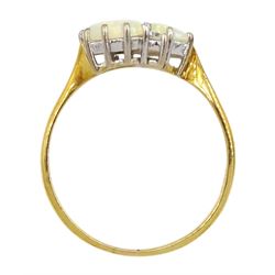 18ct gold two stone oval opal and two stone round brilliant cut diamond crossover ring, London 1981
