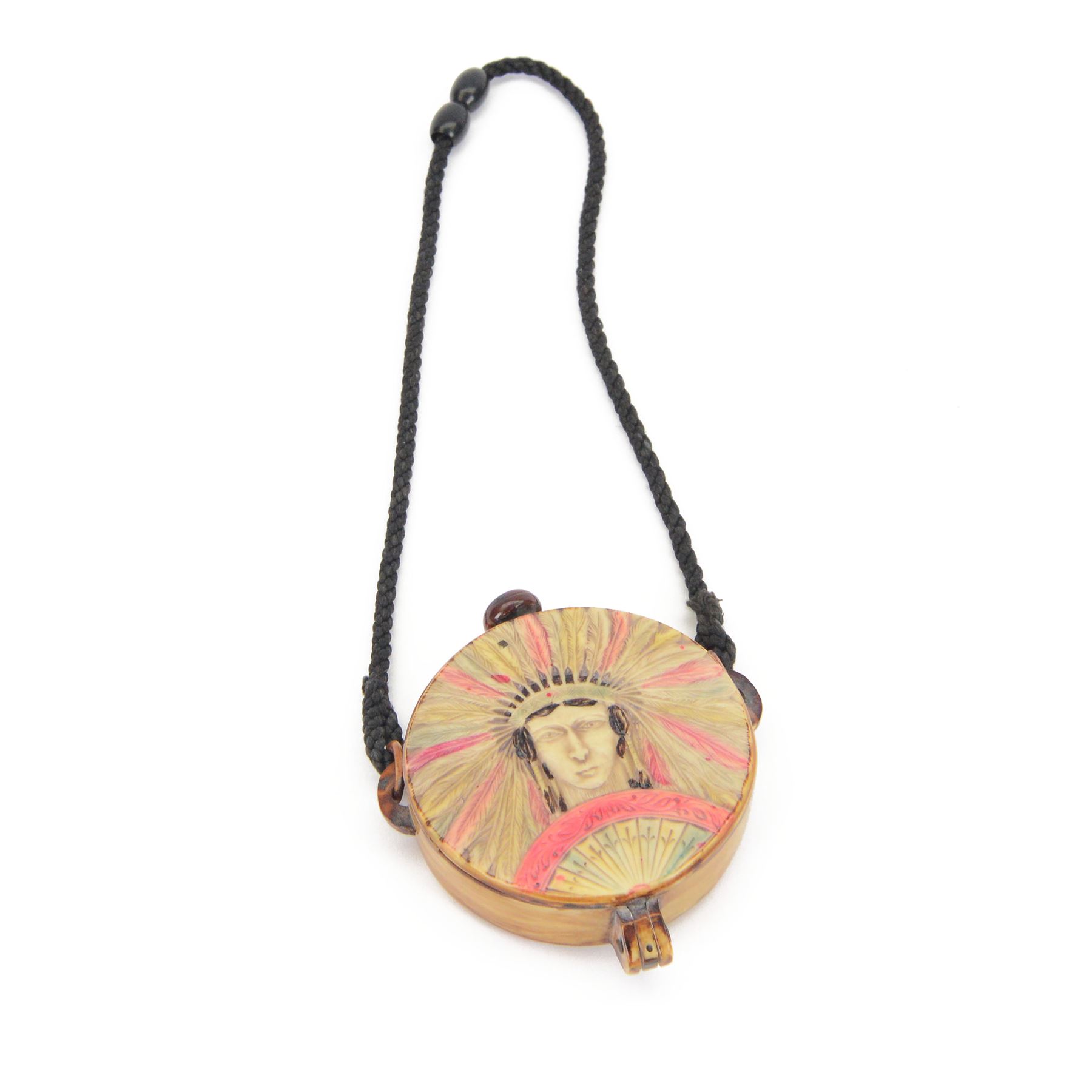 1920's lucite  compact, of circular form decorated to both sides with native American in a headdress, D7cm 