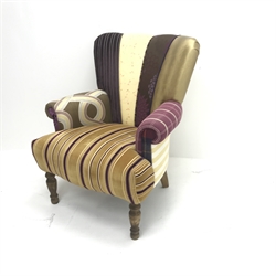 Victorian style fan back armchair, upholstered in various fabric panels, turned supports, W70cm