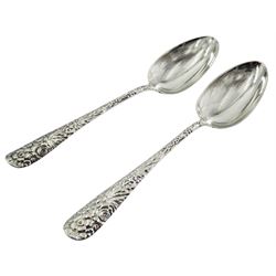 Pair of 20th century American silver table spoons, the stems cast with flower heads, impressed Sterling, L22cm, approximate weight 4.72 ozt (147 grams)
