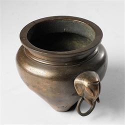 Chinese bronze tripod censer, of squat globular form, the body decorated with a band of Greek key motifs, the twin handles formed as two elephants heads, with incised shi shou two-character mark to base, H10cm