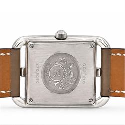 Hermès Cape Cod ladies stainless steel quartz wristwatch, Ref. CC2.710, white / silvered dial with Arabic hour markers, on taupe leather strap, boxed with guarantee dated 2011