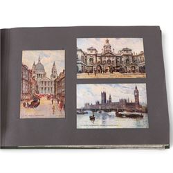 Two early to mid 20th century postcard albums, containing black and white and colour postcards, the first labelled Meine Reisen in Indien containing postcards of Arabia, India, Egypt, some personal photographs and newspaper clippings, of postcards, the second labelled Meine Reisen in England, containing mostly postcards of London, some greetings cards etc
