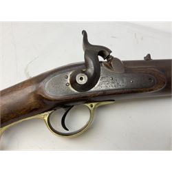 19th century Tower Armoury .650 calibre percussion cap carbine, the walnut full stock with profusely marked 51cm barrel and swivel captive ramrod under, brass furniture including butt plate inscribed 'NY/E/51', saddle ring fitting on left side, Tower lock marked (18)44, fixed front and rear sights L91cm overall