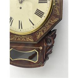 Mid-19th century mahogany veneered eight-day four-pillar single fusee drop dial wall clock with an octagonal dial surround and scroll brass inlay, circular painted steel dial with roman numerals and minute track, matching trefoil steel hands, brass bezel with a flat glass, curved trunk with brass inlaid circles and stringing around the glass pendulum aperture with a brass slip, carved ear pieces in the form of flowers and leaves, with pendulum adjustment door and movement door. With Pendulum & Key