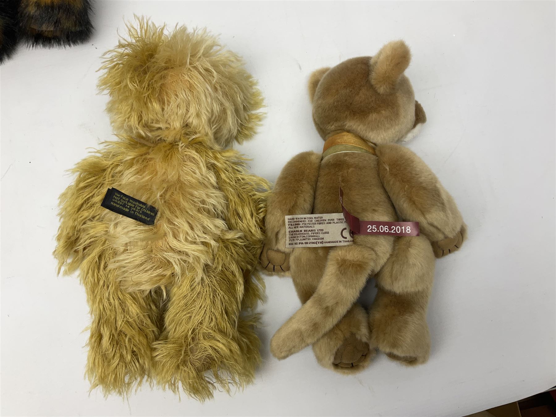 Seven Charlie Bears, comprising limited edition Anniversary Cheesecake SJ5471, designed by Isabelle lee, 431/500, Nuala CB185169, Liddy CB161648A, Philomena CB151592, and AJ CB171784B, each designed by Isabelle Lee, plus Shenanigans CB205243O, and another example lacking tag 