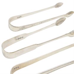 Collection of silver napkin rings and flatware, including set of Chinese bamboo design teaspoons with character mark finials, stamped 90, three pairs of Georgian and later sugar tongs, Scottish silver mustard spoon, hallmarked W S Junior, Glasgow 1833, cruet spoons, coffee spoons, etc, all stamped or hallmarked 