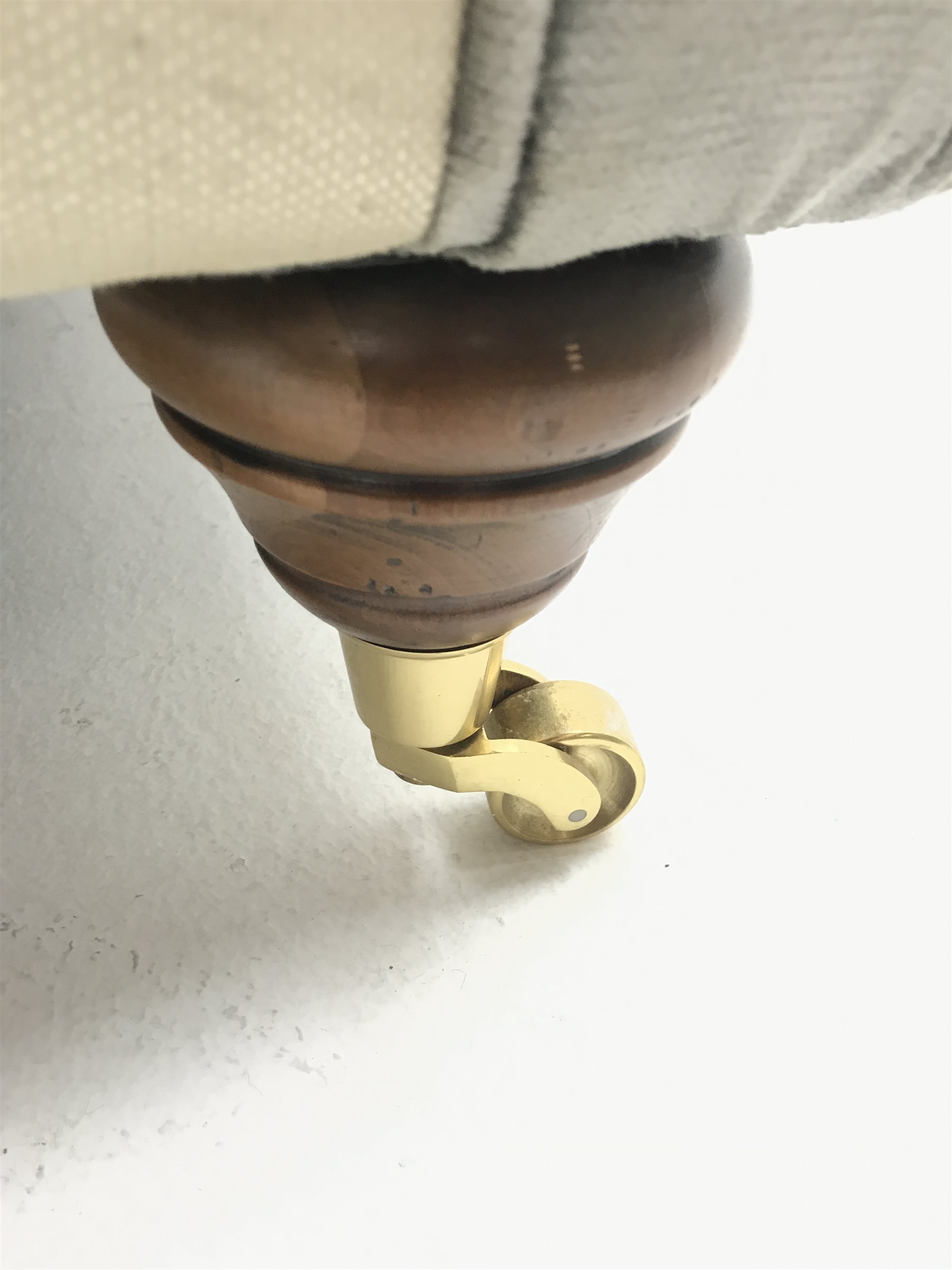 Alstons two seat Amberley sofa upholstered in grey and pale gold stripes, turned supports on castors (W195cm) and two matching armchairs (W92cm)