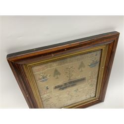 Victorian needlework sampler, depicting cat, peacock, tree and plant motifs, with a band of alphabet and numbers above, worked by Alice E Whitehead, aged eight years, dated 1886, framed, H40cm