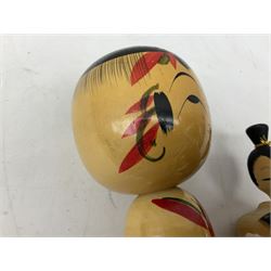 Collection of mid 20th century and later Japanese Kokeshi Dolls, to include Maiko by Torao Hosaka, Sara Vivid blossom by Masea Fujikawa,  Sun Rising by Syusaku and five other examples 