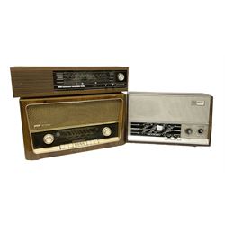 Three mid 20th century radios comprising 1950s Grundig wood cased valve radio model 3028/GB, together with a 1970s Grundig Type RF 153 CS 150 radio in teak case, and an Ekco 355 1960's valve radio, largest W60 H35cm D23cm
