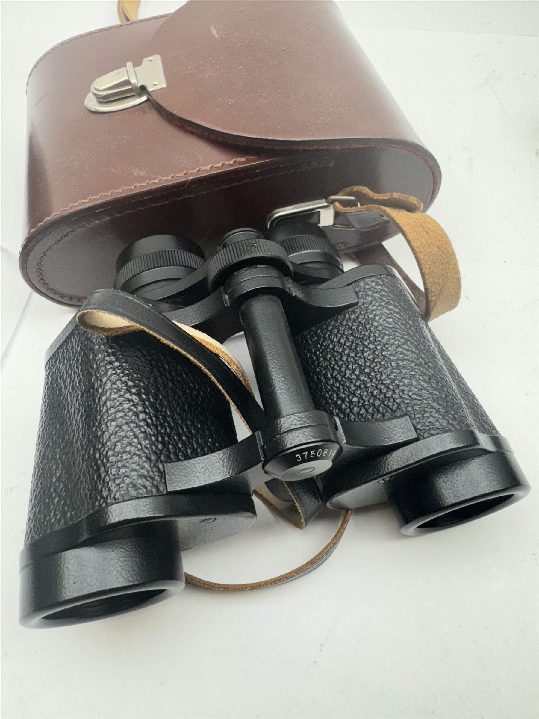 Four pairs of binoculars, to include Carl Zeiss Jena Jenoptem 8x30W serial no. 3750814, Nikon Sporting II 8x40 serial no. 604672, Minolta Pocket II 8x22 Field 7 and Jessops 12x25 Field 4.8 84m/1000m, all in carrying cases 