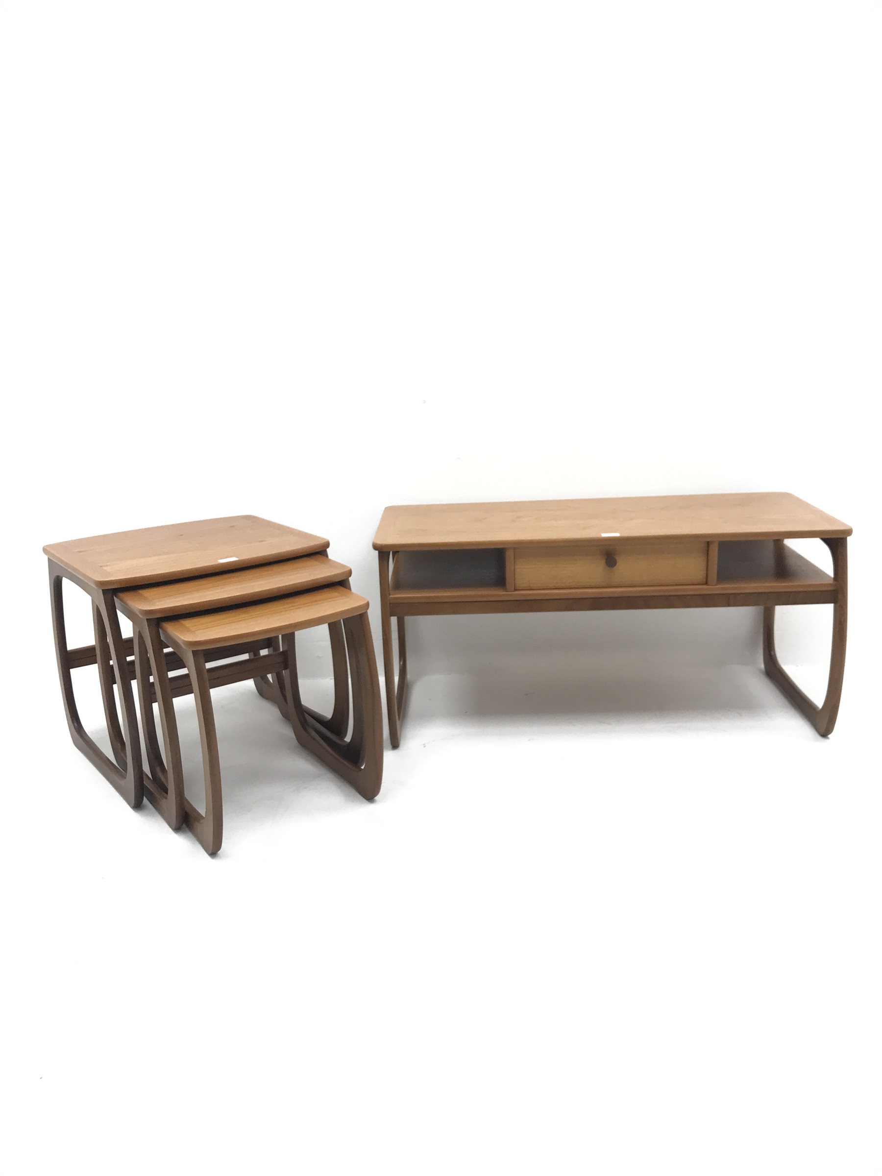 Parker Knoll teak coffee table with through drawer (107cm x 46 cm, H50cm), and a matching nest of three tables 