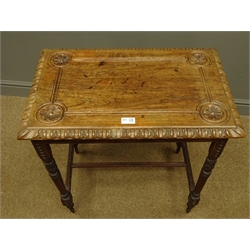  20th century carved walnut occasional rectangular table, four carved supports, W64cm, H67cm, D40cm  