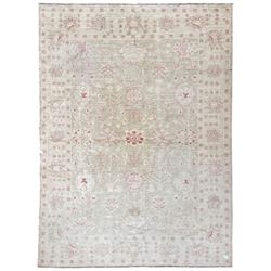 Persian design pale ivory ground carpet, decorated with stylised plant and leaf motifs in pale red