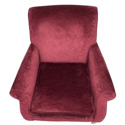 Duresta - traditional shape armchair upholstered in burgundy red velvet, on square tapering front supports (W88cm, H85cm, D103cm); together with a matching rectangular footstool with hinged seat, on turned feet with brass castors (73cm x 54cm, H38cm)