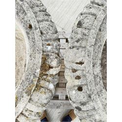 Pair of large weathered Country House Haddonstone garden urns, acanthus carved rim above gadrooned bowl, beaded detailing to the neck, raised on stepped double plinth base
