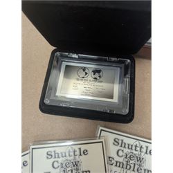 Nasa Space Shuttle program commemorative items, including album of stamp covers, telephone cards, five Shuttle Crew Emblem Collector's Series medallions, Maiden Flights bronze medallions, Missions of the Orbiter Challenger set of medallions and Apollo series medallions