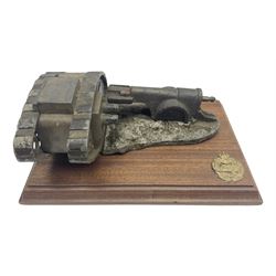 Early 20th century mechanical money bank 'Tank and Cannon' by Starkies, mounted on an oblong mahogany base with WW1 Tank Corps cap badge; patented 16th January 1919 L29.5cm