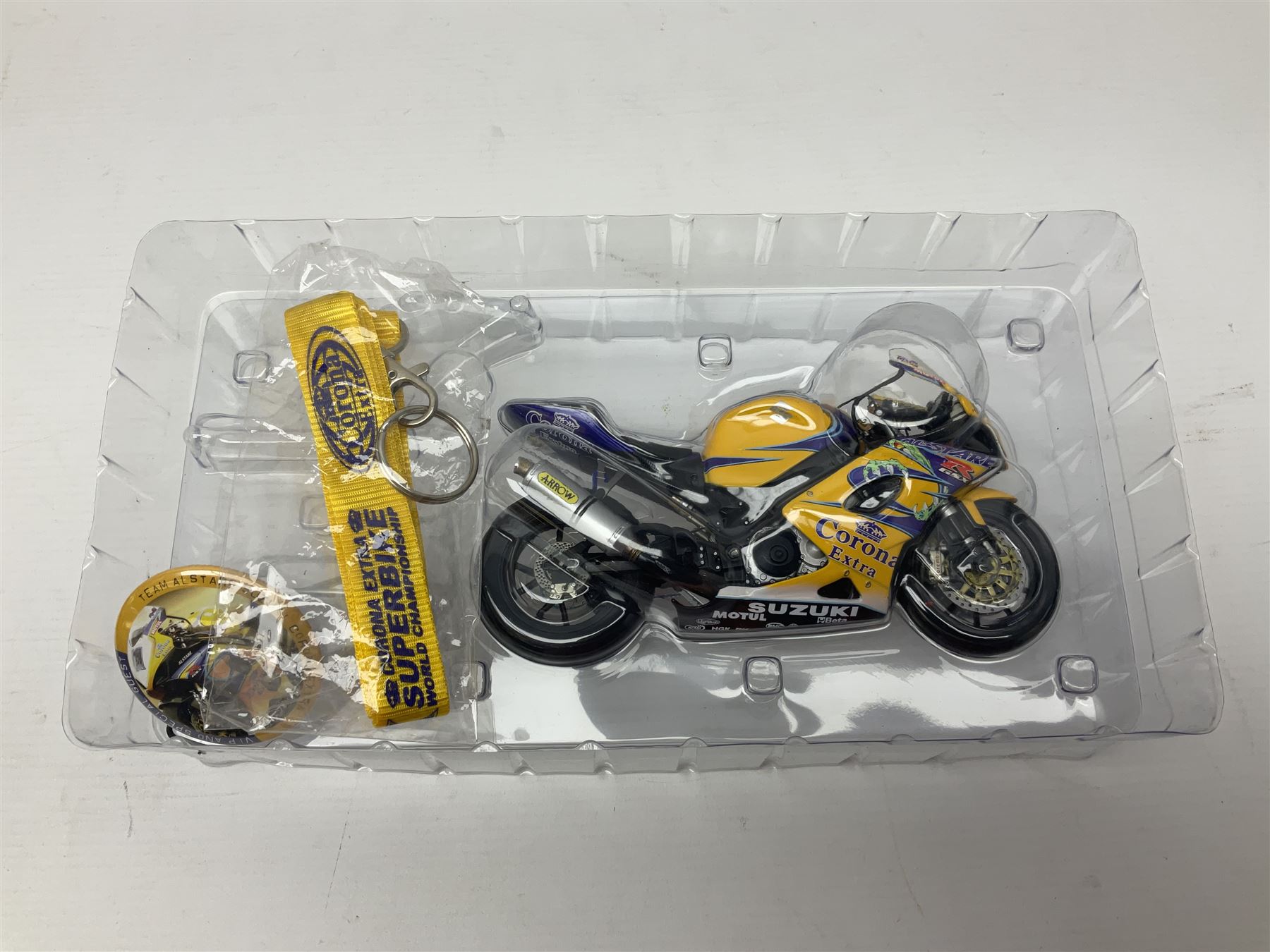 Three Minichamps 1:12 scale die-cast models of motorcycles - Suzuki GSX-R1000 Team Alstare Suzuki Corona Extra Troy Corser WSB 2005; Yamaha YZR-M1 Gauloises Yamaha Team Colin Edwards MotoGP Laguna Seca 2005; and Honda NSR 500 Loris Capirossi MotoGP 2002; all boxed (3)