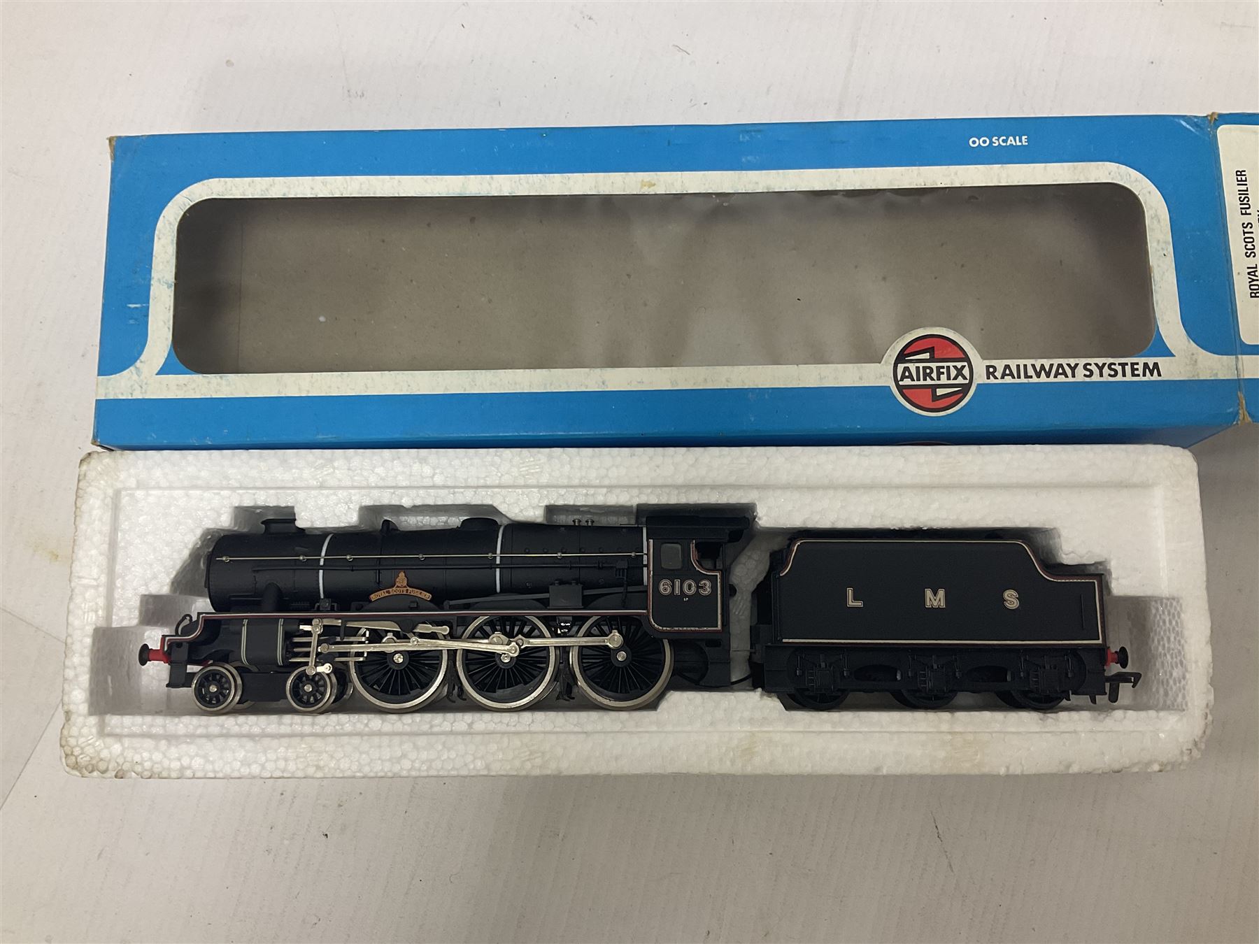 Various makers ‘00’ gauge - four locomotives comprising Mainline Railways ref.37060 Rebuilt Scot Class ‘Royal Scot’ 4-6-0 no.6100 in LMS crimson; Airfix Royal Scot Class ‘Royal Scots Fusiliers’ 4-6-0 no.6103 in LMS black and Class 4F Fowler 0-6-0 no.4454 in LMS black; Lima Class 08 Diesel 0-6-0 Shunting no.7120 in LMS black; all in original boxes (4)